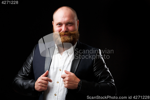 Image of Satisfied man with ginger beard