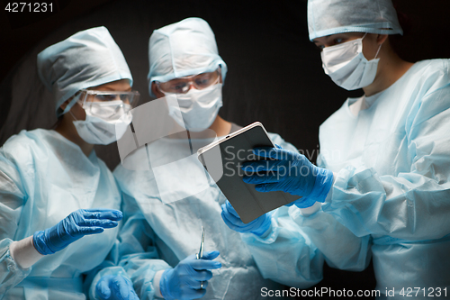 Image of Photo of doctors with tablet