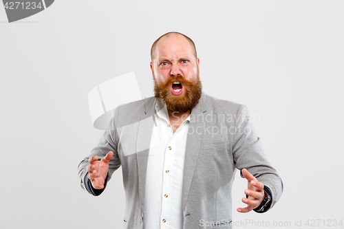 Image of Angry, dissatisfied man with beard