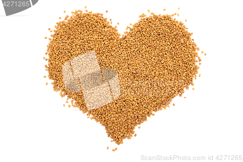 Image of Dried fenugreek seeds in a heart shape