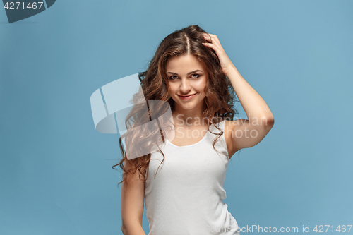 Image of The young woman\'s portrait with happy emotions