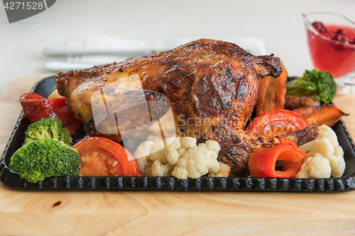 Image of Roasted chicken with vegetables.