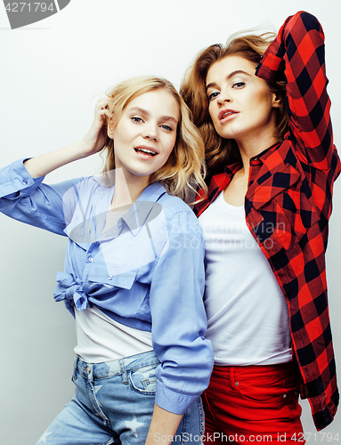 Image of best friends teenage girls together having fun, posing emotional on white background, besties happy smiling, lifestyle people concept close up. making selfie