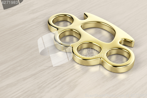 Image of Golden brass knuckles
