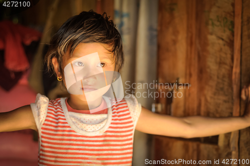 Image of Small girl with earrings  in Nepal