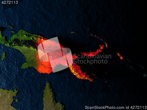 Image of Papua New Guinea in red from space at night