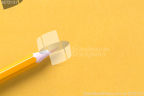 Image of Yellow crayon on yellow paper