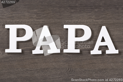 Image of Papa, written in letters, top view