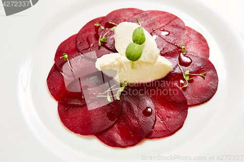 Image of Beet salad with cheese and walnuts