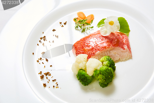 Image of The red snapper with vegetable. Shallow dof.