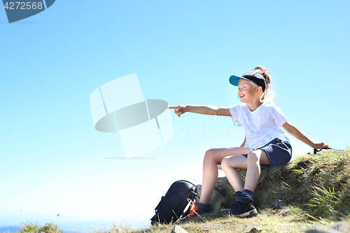 Image of Mountain expedition. Resting on the trail of a mountain expedition.