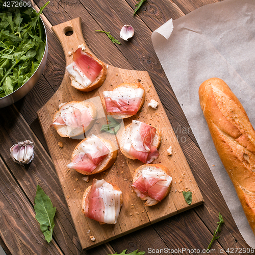 Image of Sandwiches with bacon and greens