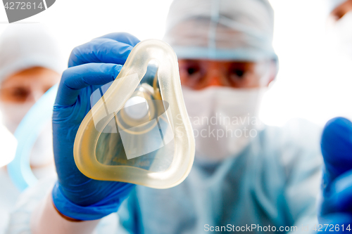 Image of Doctor with mask for anesthetic