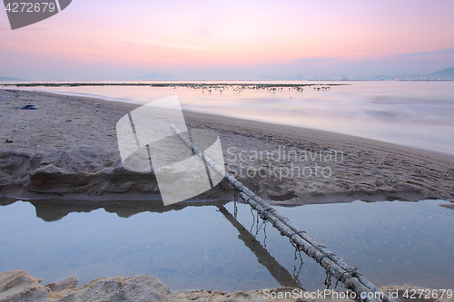 Image of Tropical sunset on the beach.