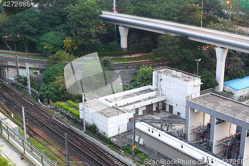 Image of very high-speed train go through the city