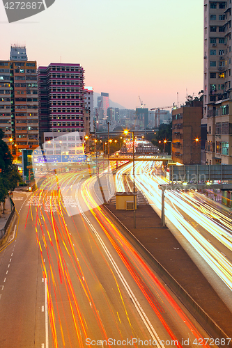 Image of Busy traffic hour in sunset momentt