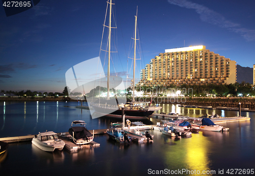 Image of large yachts in the golden coast at night 