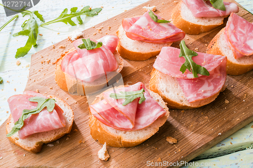 Image of Baguette with ham and greens