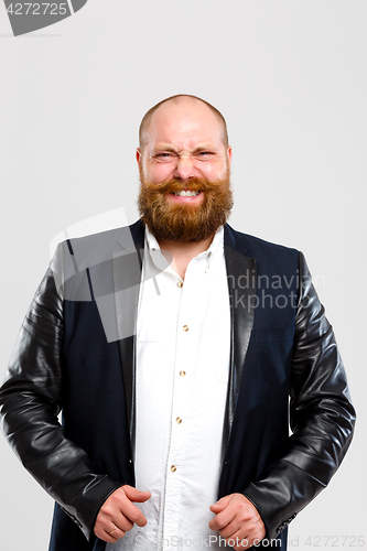 Image of Happy man in black jacket