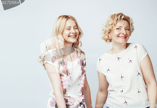 Image of mother with daughter together posing happy smiling isolated on white background with copyspace, lifestyle people concept 