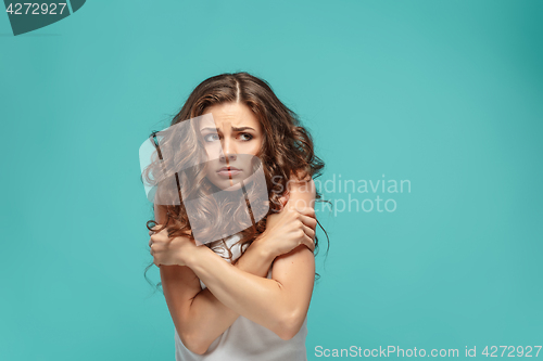 Image of The young woman\'s portrait with thoughtful emotions