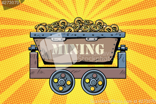 Image of mining trolley with cryptocurrency bitcoin