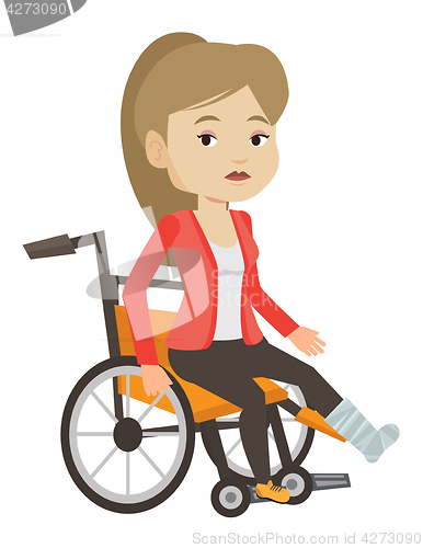 Image of Woman with broken leg sitting in wheelchair.