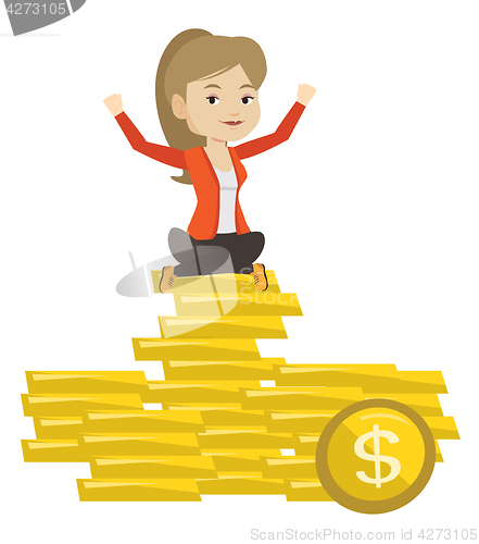 Image of Happy business woman sitting on golden coins.
