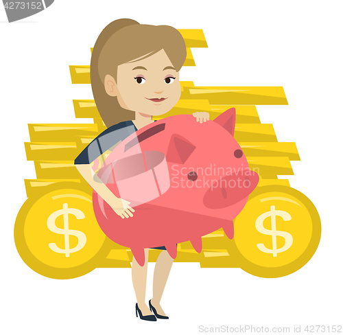 Image of Business woman holding big piggy bank.