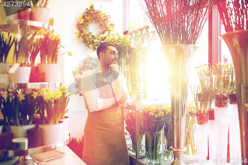 Image of florist man or seller at flower shop