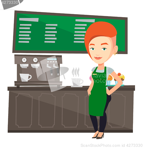 Image of Barista standing near coffee machine.