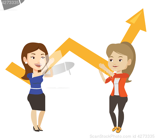 Image of Two business women holding growth graph.