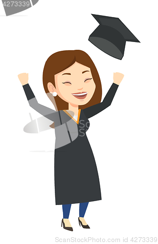 Image of Graduate throwing up graduation hat.