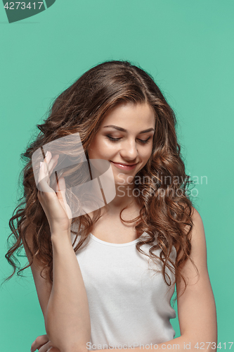 Image of The young woman\'s portrait with happy emotions