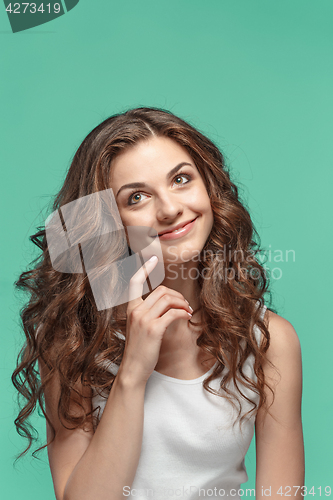 Image of The young woman\'s portrait with happy emotions