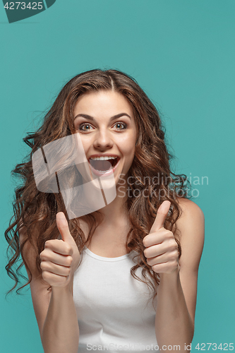 Image of The young woman\'s portrait with happy emotions