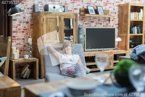 Image of Woman shopping for furniture, sofa and home decor in store