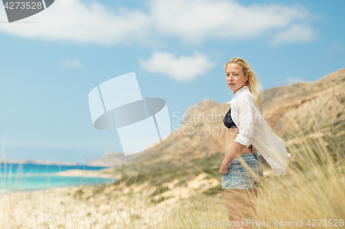 Image of Free Happy Woman Enjoying Sun on Vacations.