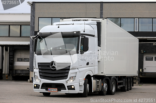 Image of White Mercedes-Benz Actros Truck on Loading Zone