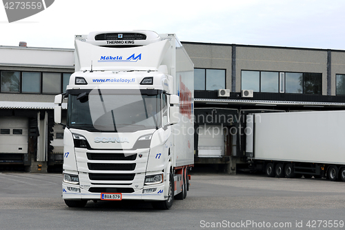 Image of Scania R580 Truck Refrigerated Trailer on Warehouse Yard 