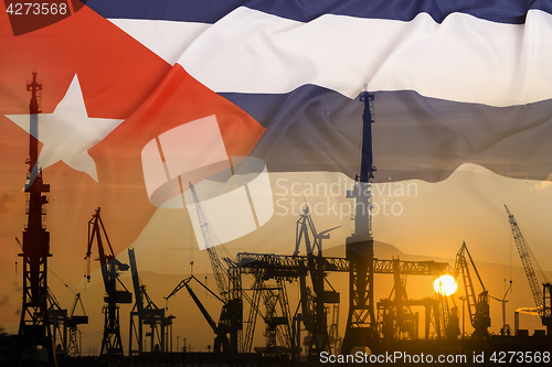 Image of Industrial concept with Cuba flag at sunset