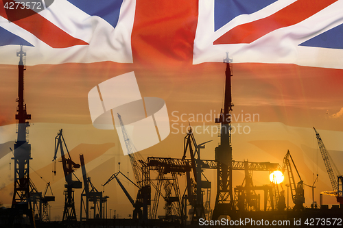 Image of Industrial concept with United Kingdom flag at sunset