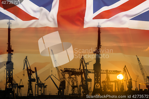 Image of Industrial concept with United Kingdom flag at sunset