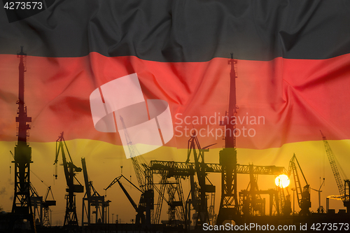 Image of Industrial concept with Germany flag at sunset