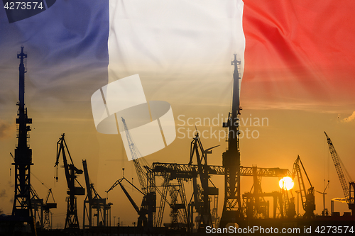 Image of Industrial concept with France flag at sunset