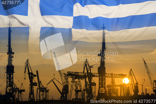 Image of Industrial concept with Greece flag at sunset