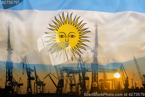 Image of Industrial concept with Argentina flag at sunset