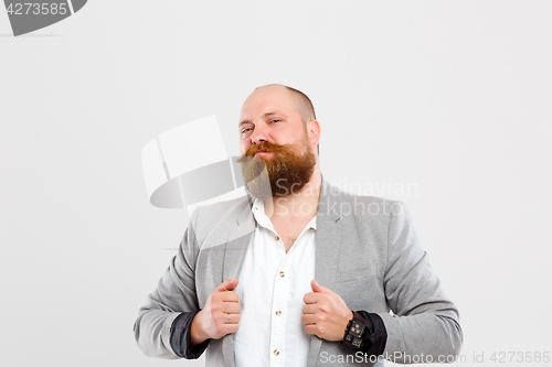 Image of Satisfied man in gray jacket