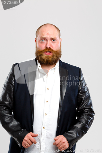 Image of Frowning man with ginger beard