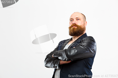 Image of Brutal man with arms crossed